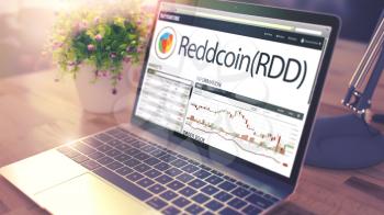 Modern Workplace with Ultrabook showing Web Page with Crypto Exchange of Reddcoin - RDD. Tinted Image with Selective Focus. 3D Illustration .