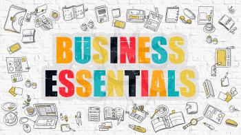 Business Essentials. Multicolor Inscription on White Brick Wall with Doodle Icons Around. Modern Style Illustration with Doodle Design Icons. Business Essentials on White Brickwall Background.