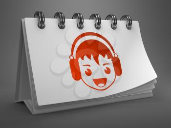 Happy Boy with Headphones Icon on White Desktop Calendar Isolated on Gray Background. Sound, Music Concept.