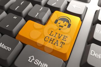 Live Chat Concept. Boy with Headset Icon on Orange Keyboard Button.