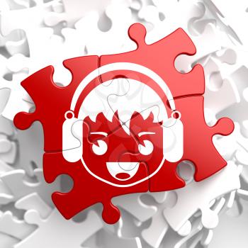 Happy Boy with Headphones Icon on Red Puzzle. Sound Concept.