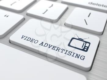 Video Advertising - Button with TV Set Icon on White Computer Keyboard.