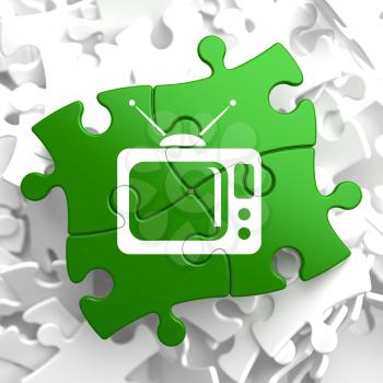 TV Set Icon on Green Puzzle. Television Concept.