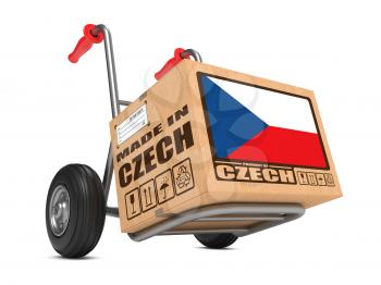 Cardboard Box with Flag of Czech Republic and Made in Czech Republic Slogan on Hand Truck White Background. Free Shipping Concept.
