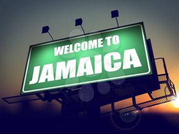 Welcome to Jamaica - Green Billboard on the Rising Sun Background.