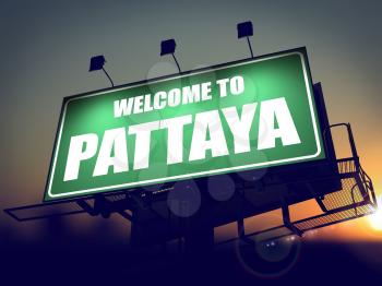 Welcome to Pattaya - Green Billboard on the Rising Sun Background.