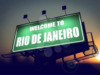 Welcome to Rio De Janeiro - Green Billboard on the Rising Sun Background.