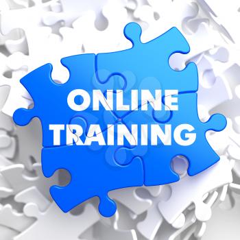 Online Training on Blue Puzzle on White Background.