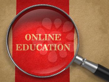 Online Education concept. Magnifying Glass on Old Paper with Red Vertical Line Background.