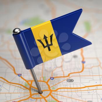 Small Flag of Barbados on a Map Background with Selective Focus.