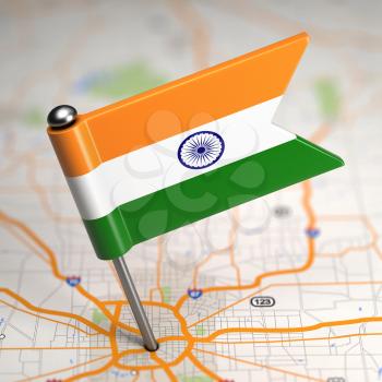Small Flag of Republic of India on a Map Background with Selective Focus.