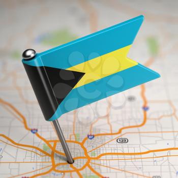 Small Flag of Bahamas on a Map Background with Selective Focus.