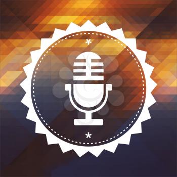 Microphone Icon. Retro label design. Hipster background made of triangles, color flow effect.