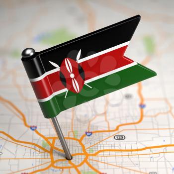 Small Flag of Kenya on a Map Background with Selective Focus.