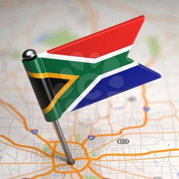 Small Flag of South Africa on a Map Background with Selective Focus.