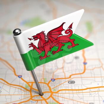 Small Flag of Wales on a Map Background with Selective Focus.