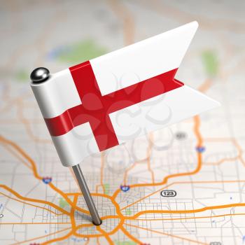Small Flag of England on a Map Background with Selective Focus.