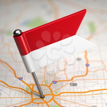 Small Flag of Indonesia on a Map Background with Selective Focus.
