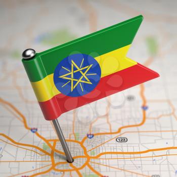 Small Flag Federal Democratic Republic of Ethiopia on a Map Background with Selective Focus.