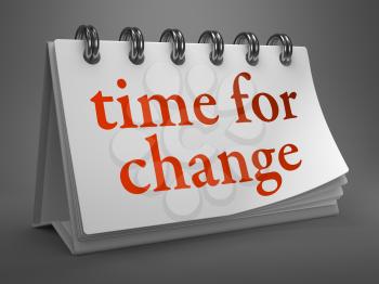Time for Change - Red Word on White Desktop Calendar Isolated on Gray Background.