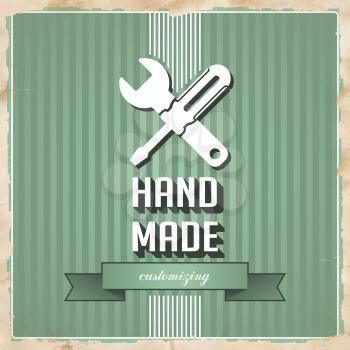 HandMade with Icon of Crossed Screwdriver and Wrench and Slogan on Green Striped Background. Vintage Concept in Flat Design.