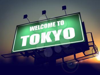 Welcome to Tokyo - Green Billboard on the Rising Sun Background.