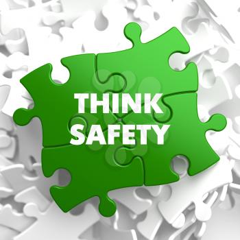 Think Safety on Green Puzzle on White Background.