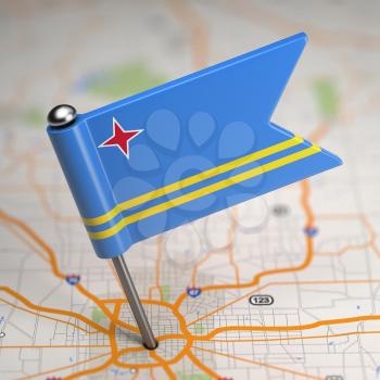Small Flag of Aruba on a Map Background with Selective Focus.