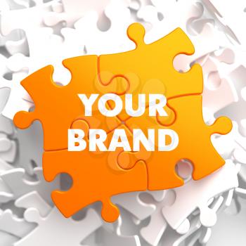Your Brand on Orange Puzzle on White Background.