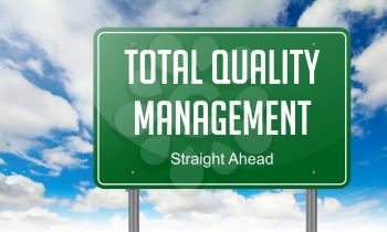 Highway Signpost with Total Quality Management wording on Sky Background,