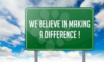 Highway Signpost with We Believe in Making a Difference wording on Sky Background.