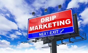 Drip Marketing - Red Billboard on Sky Background. Business Concept.