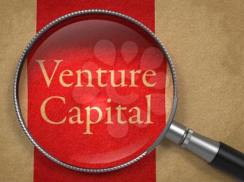 Venture Capital through Magnifying Glass on Old Paper with Red Vertical Line.