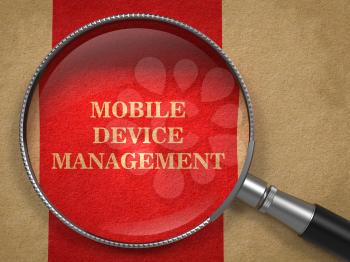 Mobile Device Management. Magnifying Glass on Old Paper with Red Vertical Line.
