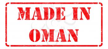 Made in Oman - inscription on Red Rubber Stamp Isolated on White.