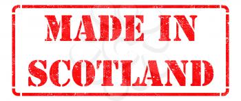 Made in Scotland - inscription on Red Rubber Stamp Isolated on White.