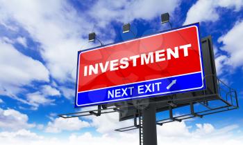 Investment - Red Billboard on Sky Background. Business Concept.