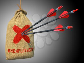 Unemployment - Three Arrows Hit in Red Target on a Hanging Sack on Green Bokeh Background.