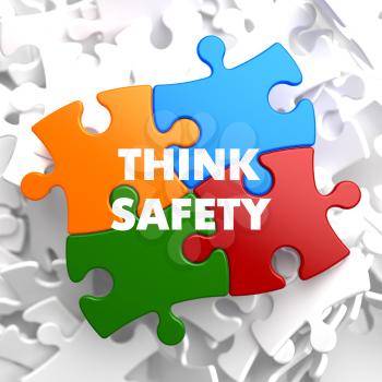 Think Safety on Multicolor Puzzle on White Background.