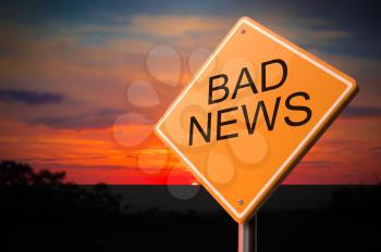 Bad News on Warning Road Sign on Sunset Sky Background.