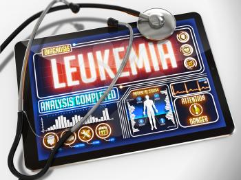 Medical Tablet with the Diagnosis of Leukemia on the Display and a Black Stethoscope on White Background.