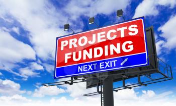 Projects Funding - Red Billboard on Sky Background. Business Concept.