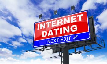 Internet Dating - Red Billboard on Sky Background. Business Concept.