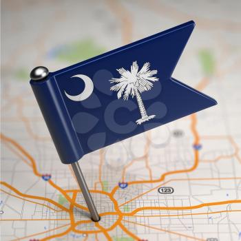 Small Flag of South Carolina on a Map Background with Selective Focus.