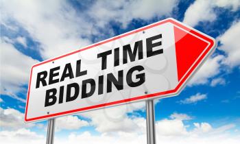 Real Time Bidding - Inscription on Red Road Sign on Sky Background.