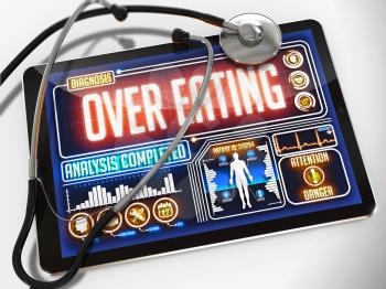 Over Eating - Diagnosis on the Display of Medical Tablet and a Black Stethoscope on White Background.