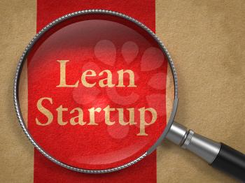 Lean Startup through a Magnifying Glass on Old Paper with Red Line.