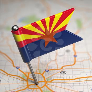 Small Flag of Arizona on a Map Background with Selective Focus.