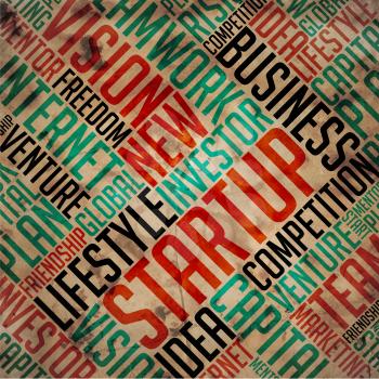 Startup - Grunge Printed Word Collage on Old Fulvous Paper.