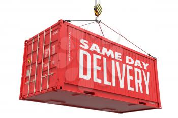 Same Day Delivery - Red Cargo Container hoisted by hook, Isolated on White Background.